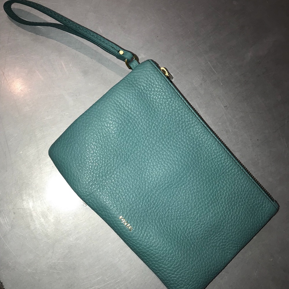 Fossil clutch/wristlet